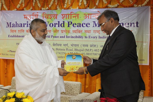 Brahmachari Girish Ji is presenting book on Transcendental Meditation.